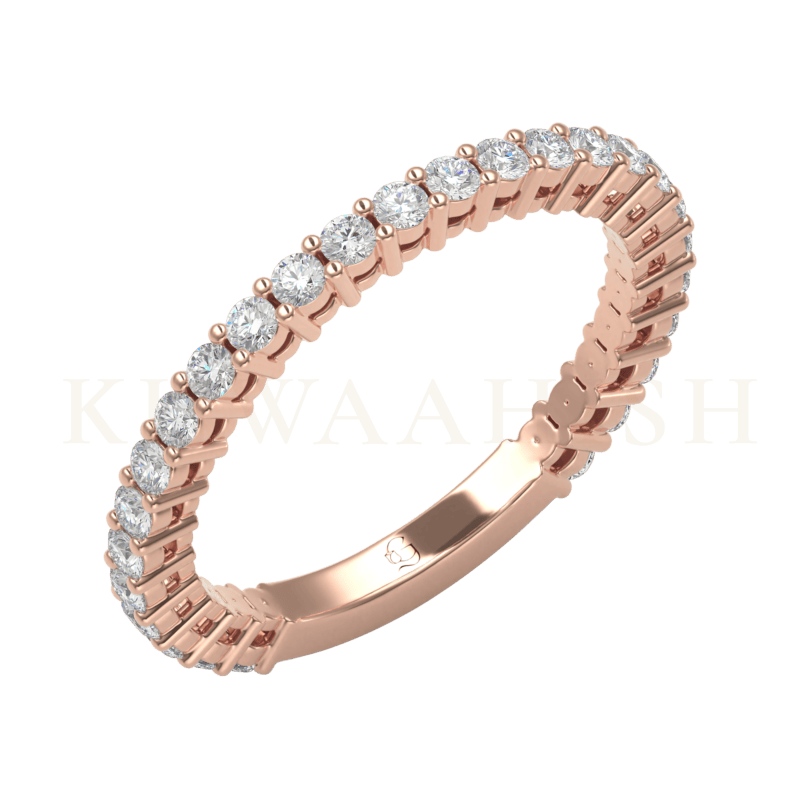 Slanting view of Synchronized Sparkle Diamond Eternity Ring in rose gold.