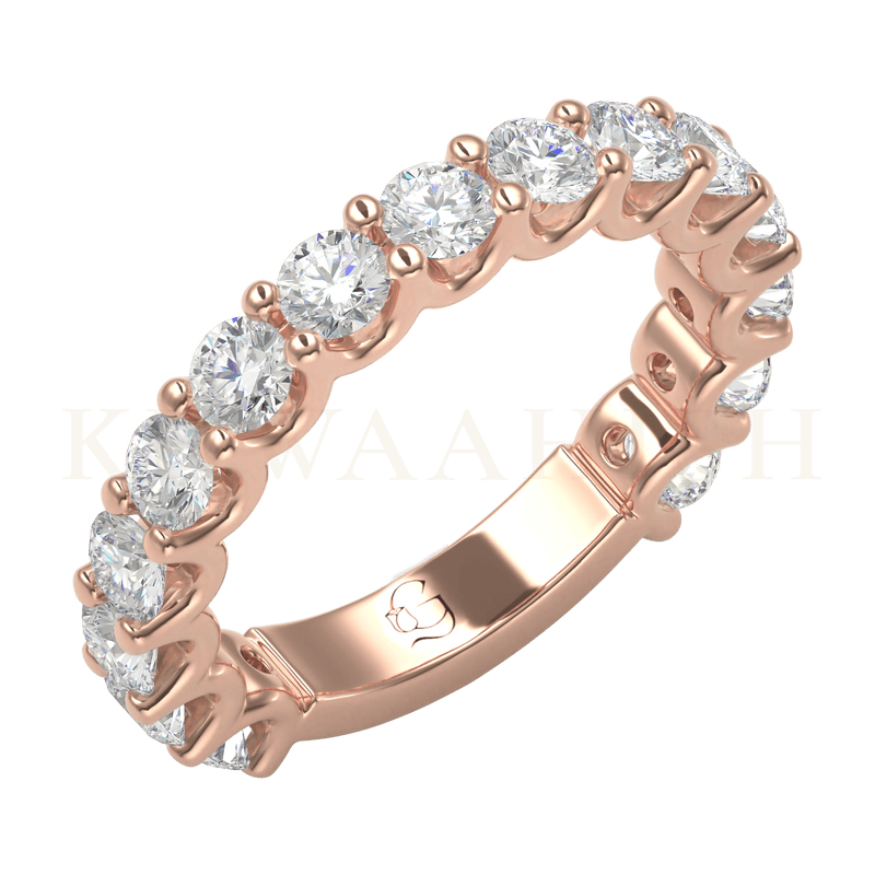 Slanting view of Crowning Glory Diamond Eternity Ring in rose gold.