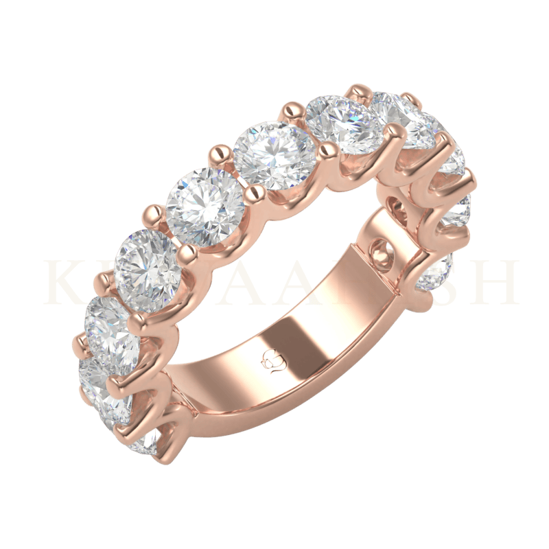Slanting view of Delightful Dazzle Diamond Eternity Ring in rose gold.