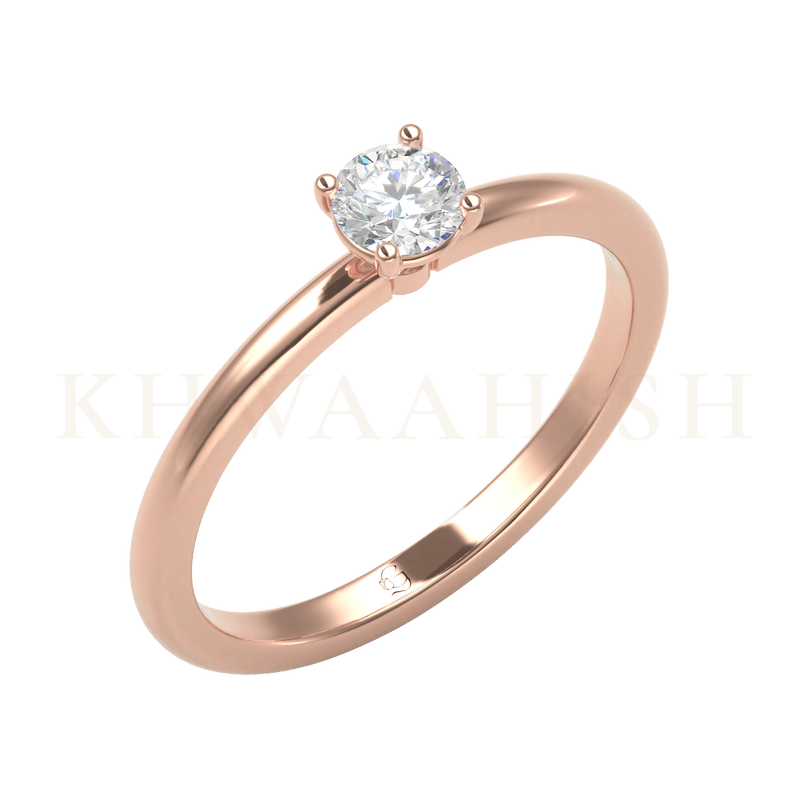 Slanting view of 0.25 ct Simplistic Beauty Round Solitaire Diamond Ring in rose gold.