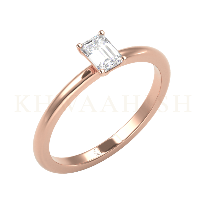 Slanting view of 0.40 ct Perennial Passion Emerald Cut Solitaire Diamond Ring in rose gold.