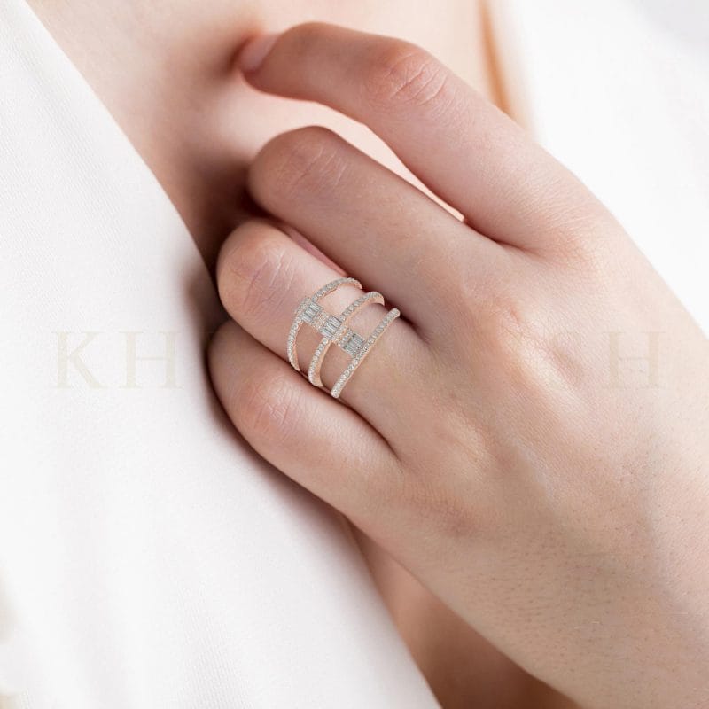 Close-up view of a model wearing Rows of Dazzles Diamond Band Ring  in rose gold.